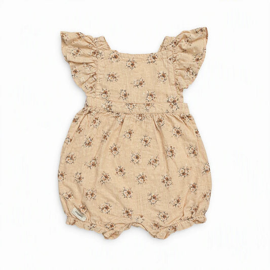 Blommig jumpsuit från Newbie - Storlek 86 - Beige