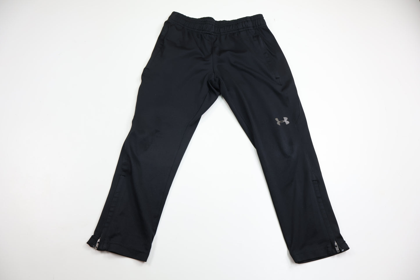 Träningsbyxor från Under Armor - Storlek 110/116 - Svart
