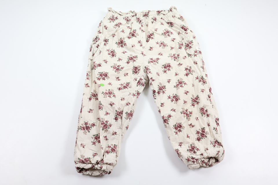 Blommiga fodrade byxor från Newbie - Storlek 98 - Beige