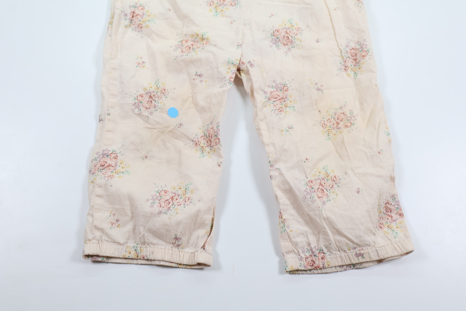 Blommig jumpsuit från Newbie - Storlek 92 - Rosa