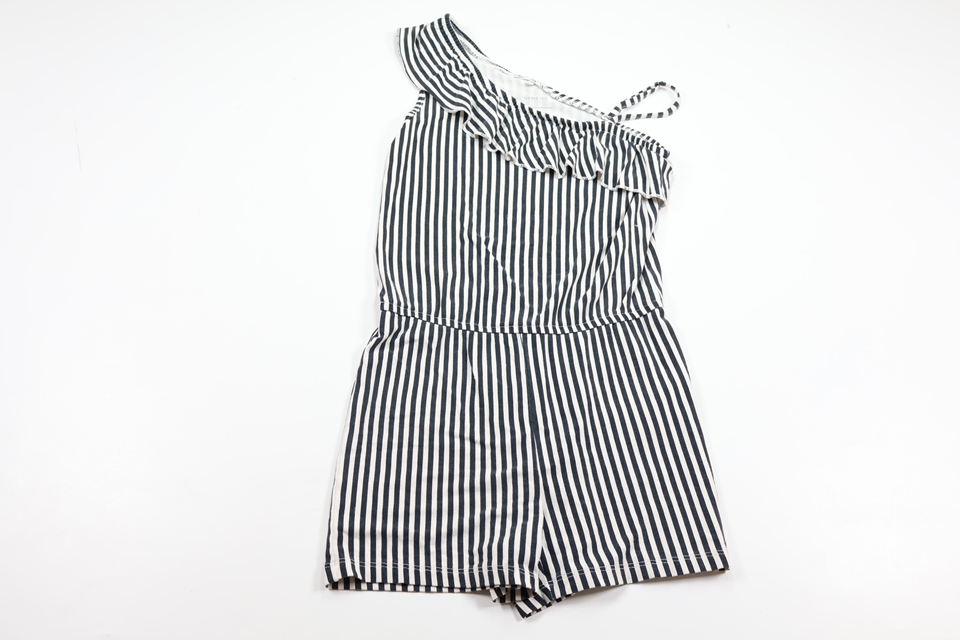 Randig jumpsuit från Name It - Storlek 128 - Svart