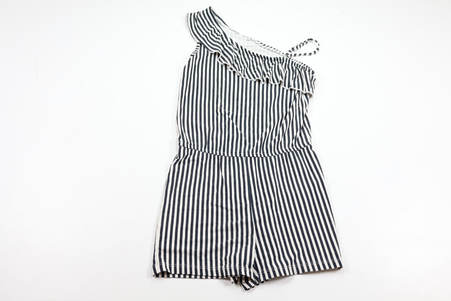 Randig jumpsuit från Name It - Storlek 128 - Svart