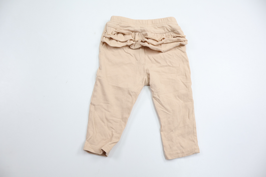 Byxor med volang från Sinsay - Storlek 74 - Beige