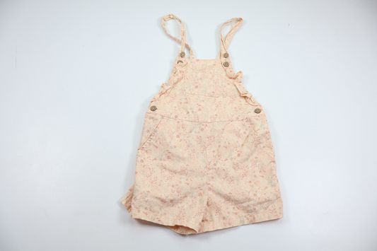 Blommiga hängselshorts från Newbie - Storlek 110 - Rosa