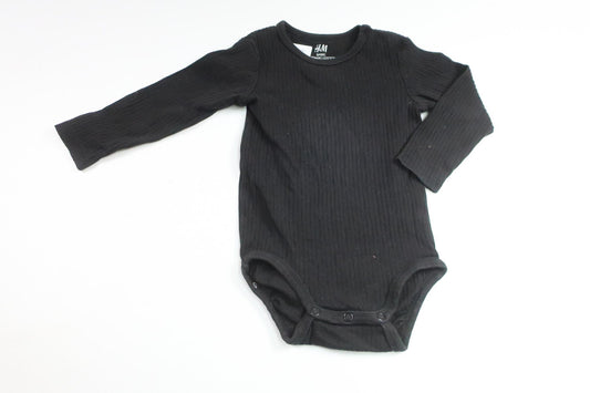 Ribbad body från H&M - Storlek 74 - Svart