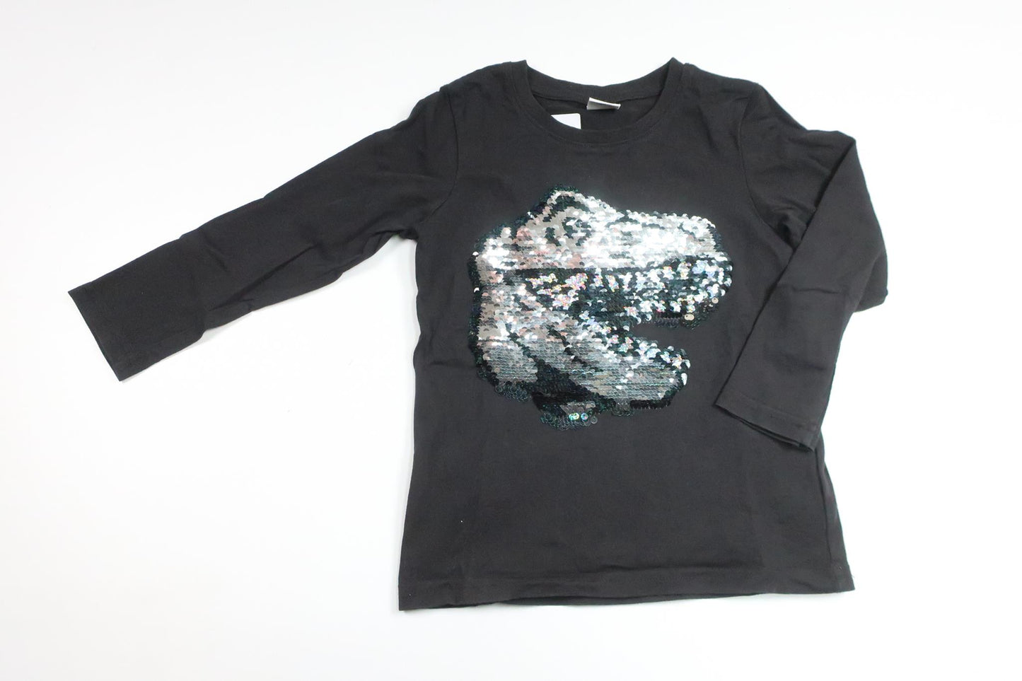 Tröja med vändbara paljetter från Lindex - Storlek 104 - Svart