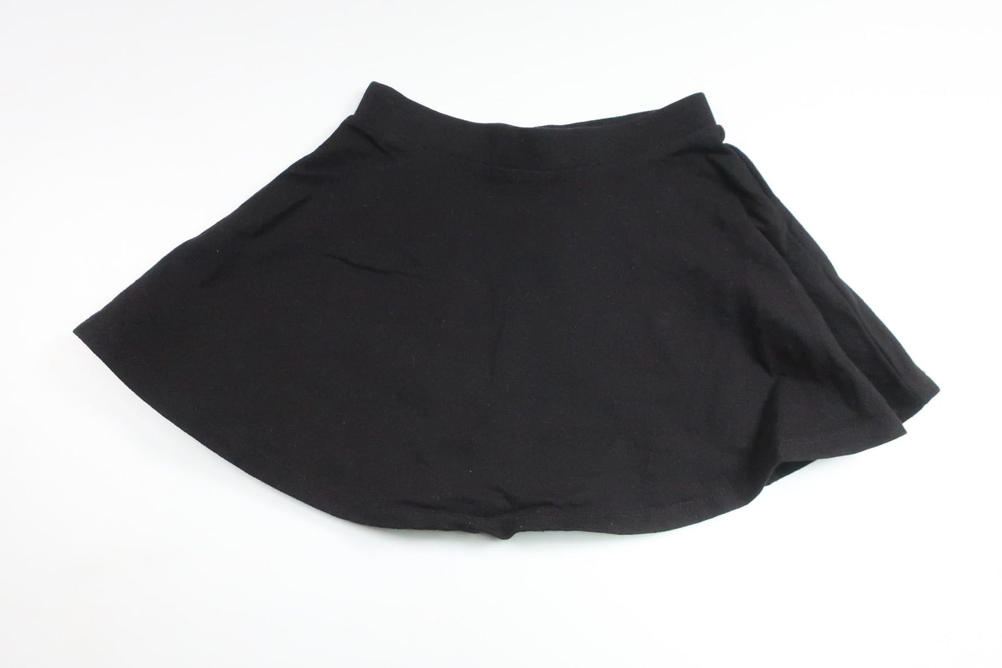 Kjol från Kappahl - Storlek 98/104 - Svart