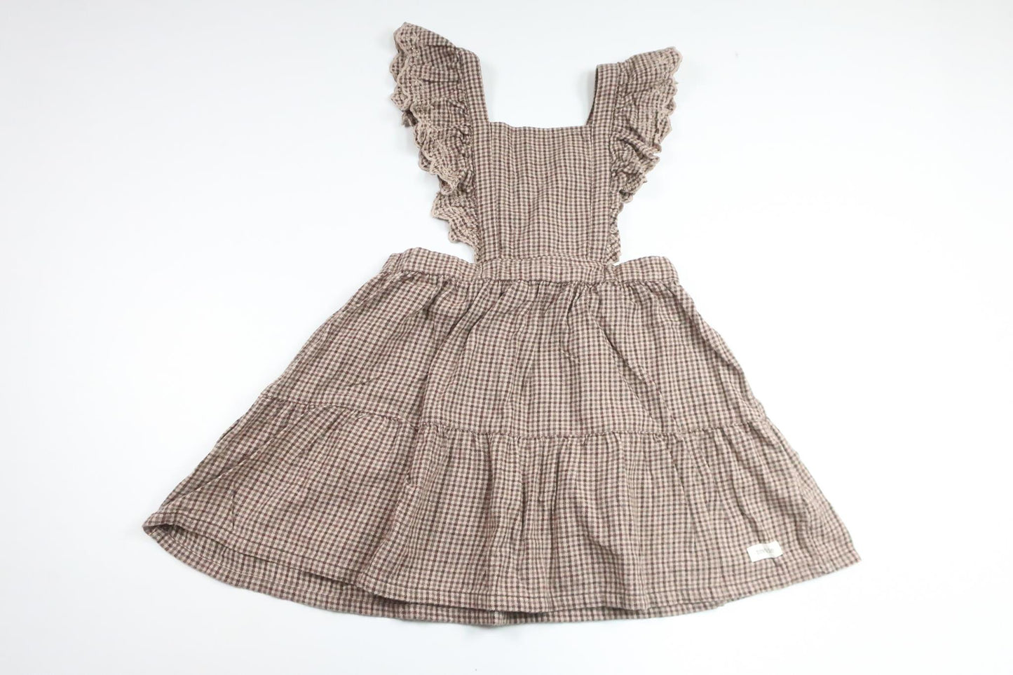 Rutig hängselklänning från Newbie - Storlek 116 - Brun