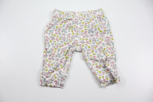 Blommiga byxor från Carter's - Storlek 56/62 - Vit