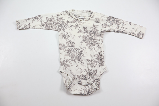 Blommig body från Newbie - Storlek 56 - Vit