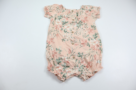 Blommig jumpsuit från Newbie - Storlek 80 - Rosa