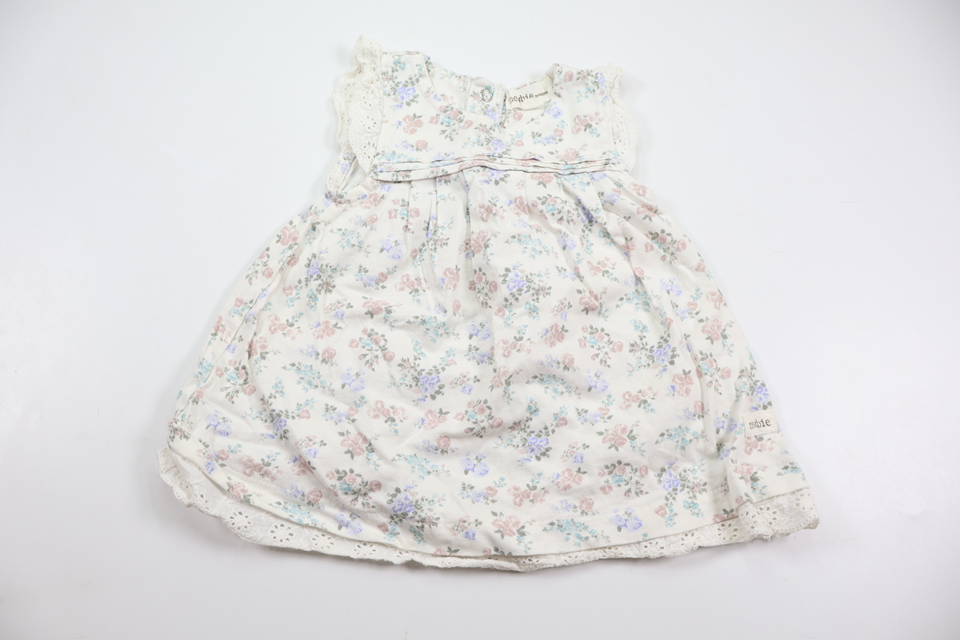 Blommig klänning från Newbie - Storlek 68 - Vit