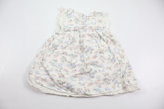 Blommig klänning från Newbie - Storlek 68 - Vit
