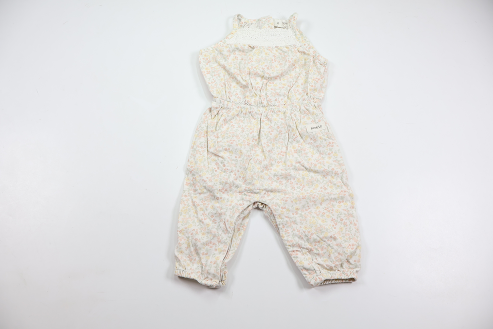 Blommig jumpsuit från Newbie - Storlek 62 - Vit