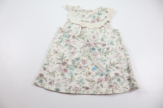 Blommig klänning från Newbie - Storlek 80 - Vit
