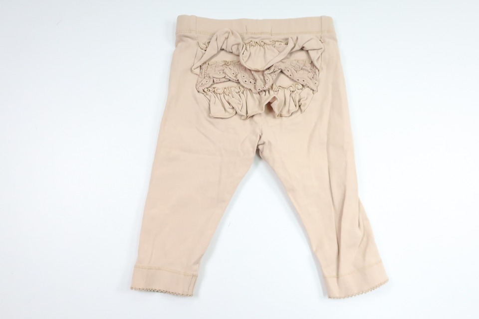 Byxor med volang från Newbie - Storlek 68 - Beige