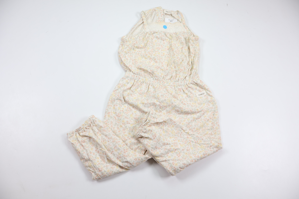 Blommig jumpsuit från Newbie - Storlek 86 - Vit