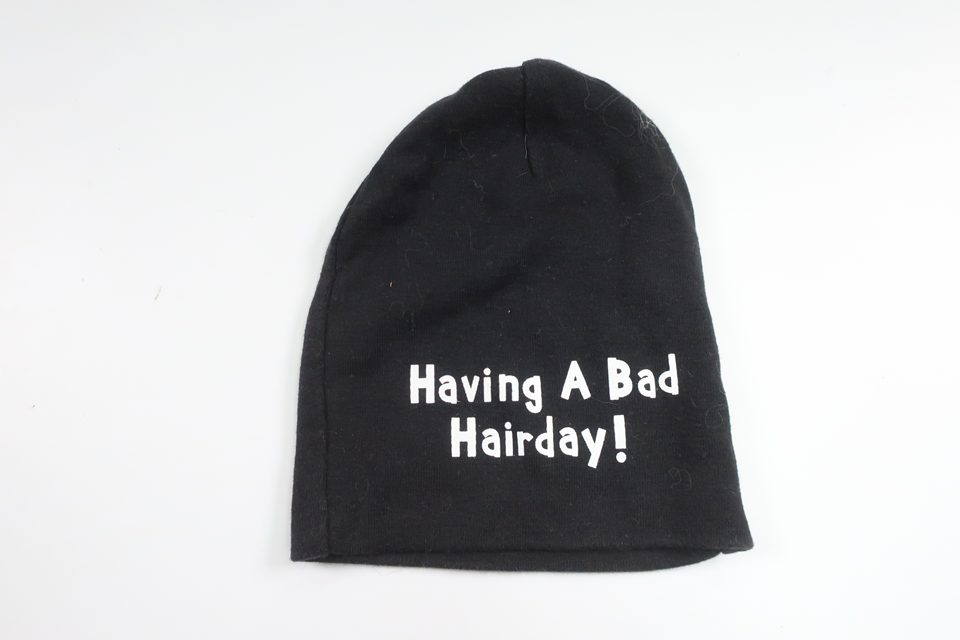 Mössa "Having a Bad Hair Day" från Åhléns - Storlek 44/46 - Svart
