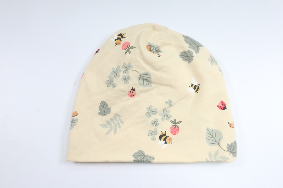 Mössa från Lindex - Storlek 44/46 - Gul