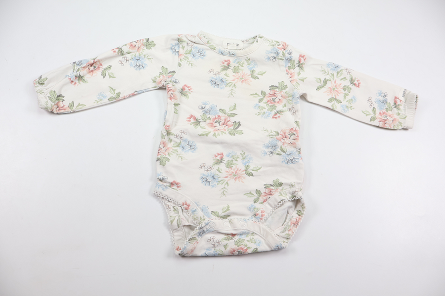 Blommig body från Newbie - Storlek 68 - Vit