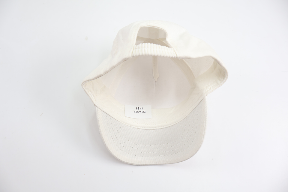 Keps från H&M - Storlek 68 - Vit