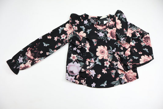 Blommig blus med volang från Kappahl - Storlek 110 - Svart