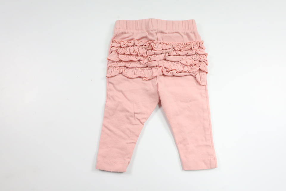 Byxor med volang från Petite Mini - Storlek 56 - Rosa