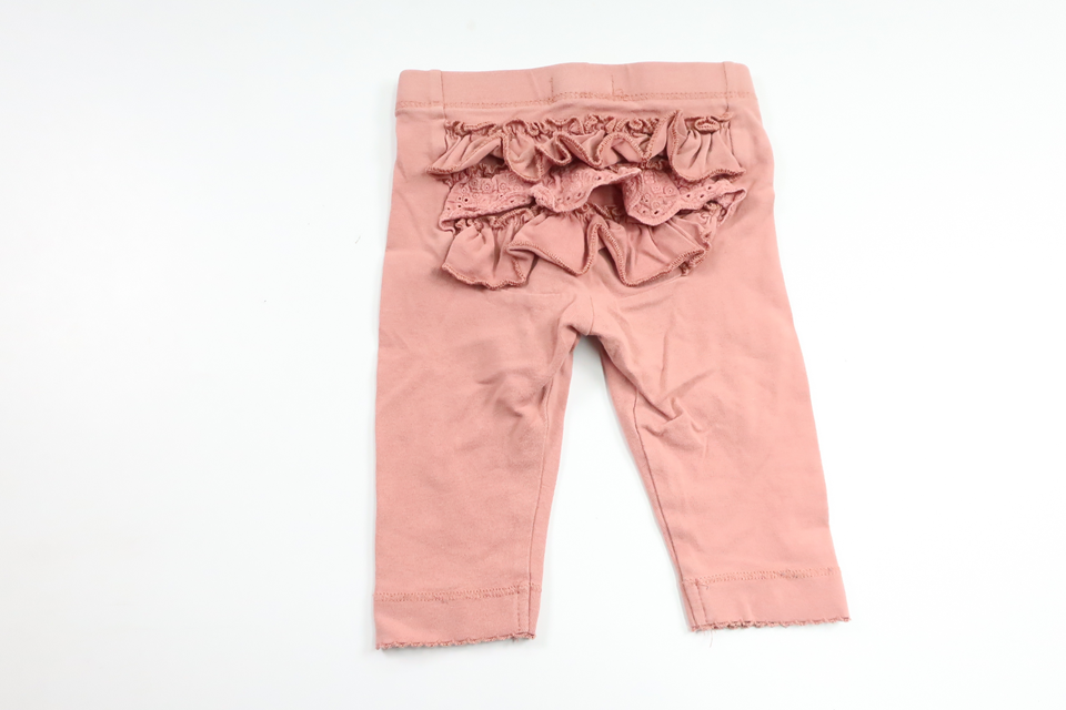 Byxor med volang från Newbie - Storlek 62 - Rosa
