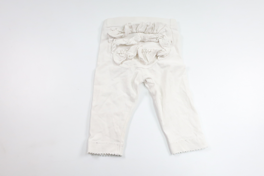 Byxor med volang från Newbie - Storlek 68 - Vit