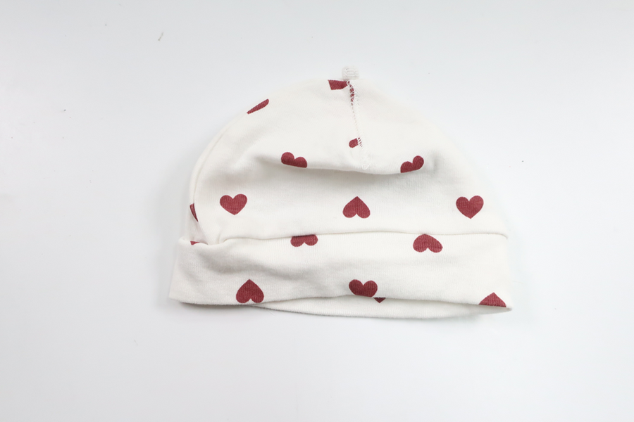Mössa med hjärtan från H&M - Storlek 50 - Vit