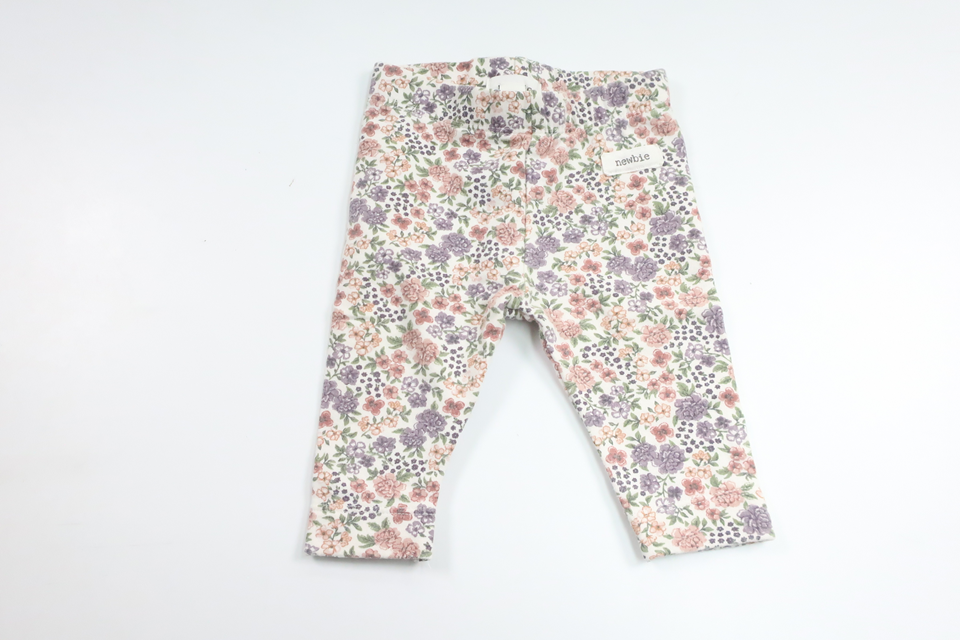 Blommiga byxor från Newbie - Storlek 56 - Vit