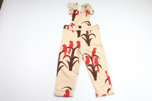 Jumpsuit med fåglar från Mini Rodini - Storlek 92/98 - Beige