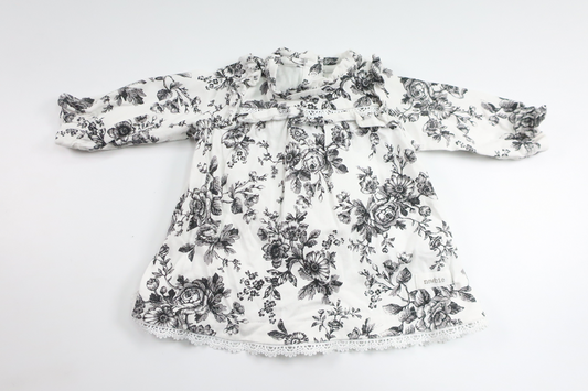 Blommig klänning från Newbie - Storlek 56 - Vit