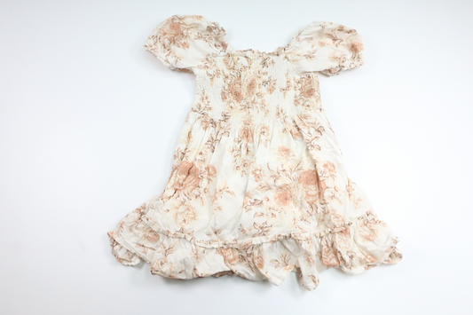 Blommig klänning från Newbie - Storlek 110 - Benvit