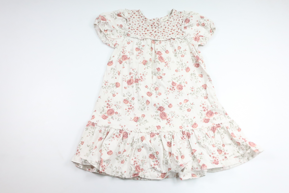 Blommig klänning från Newbie - Storlek 110 - Vit