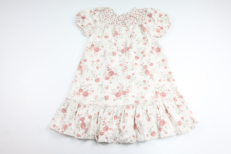 Blommig klänning från Newbie - Storlek 110 - Vit