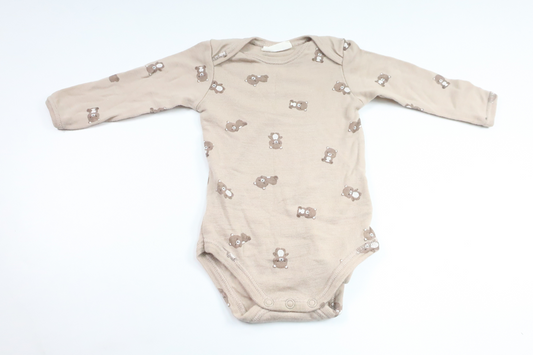 Body i 100% ull med nallar från Kappahl - Storlek 62 - Beige