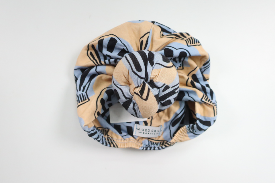 Mössa från Mixed Grill Banjul - Storlek 50/56 - Beige