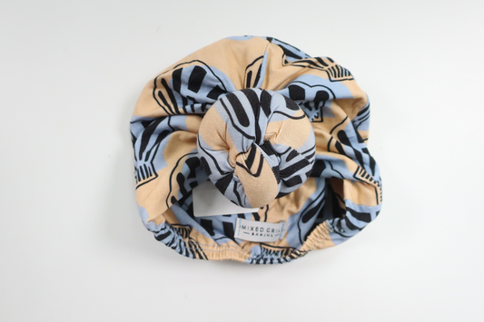 Mössa från Mixed Grill Banjul - Storlek 50/56 - Beige