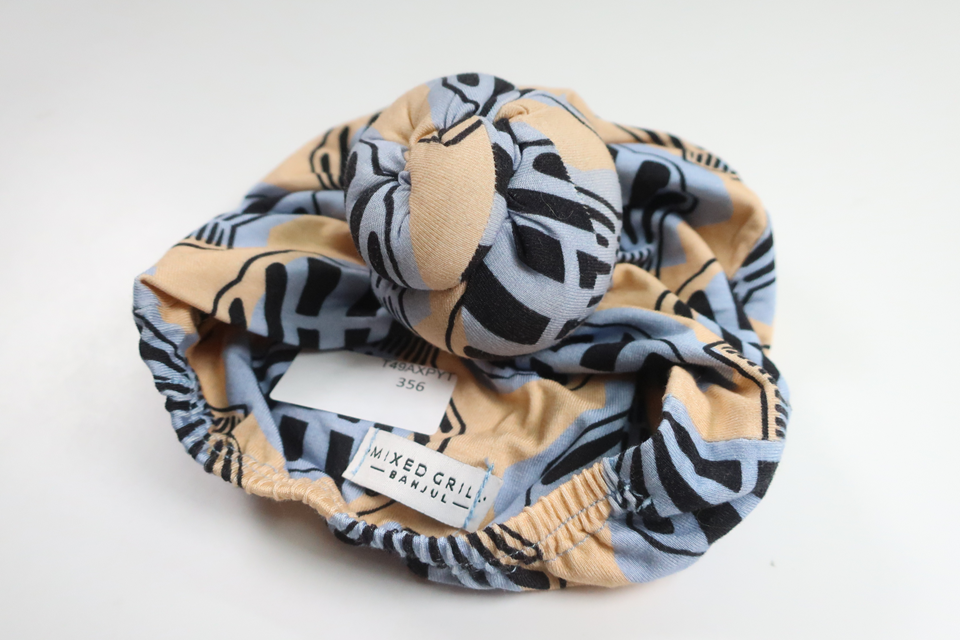 Mössa från Mixed Grill Banjul - Storlek 50/56 - Beige