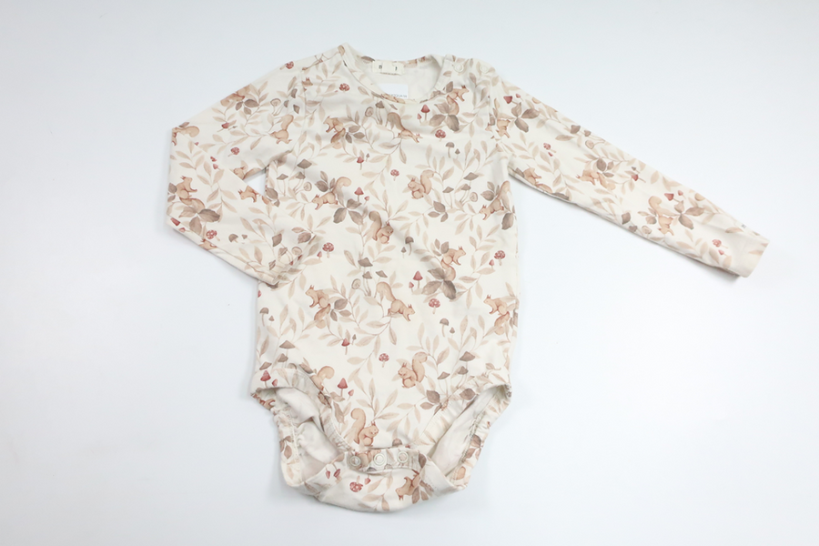 Body från Newbie - Storlek 86 - Benvit