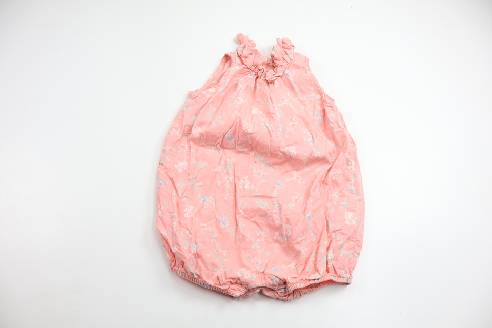 Blommig jumpsuit från Newbie - Storlek 86 - Rosa
