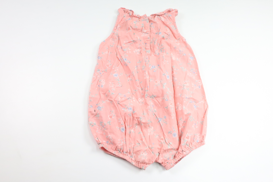 Blommig jumpsuit från Newbie - Storlek 80 - Rosa