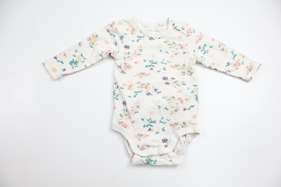 Blommig body från Lindex - Storlek 62 - Vit