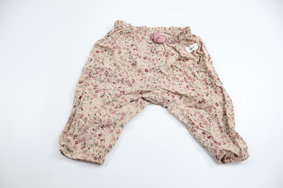 Blommiga byxor från Newbie - Storlek 68 - Rosa