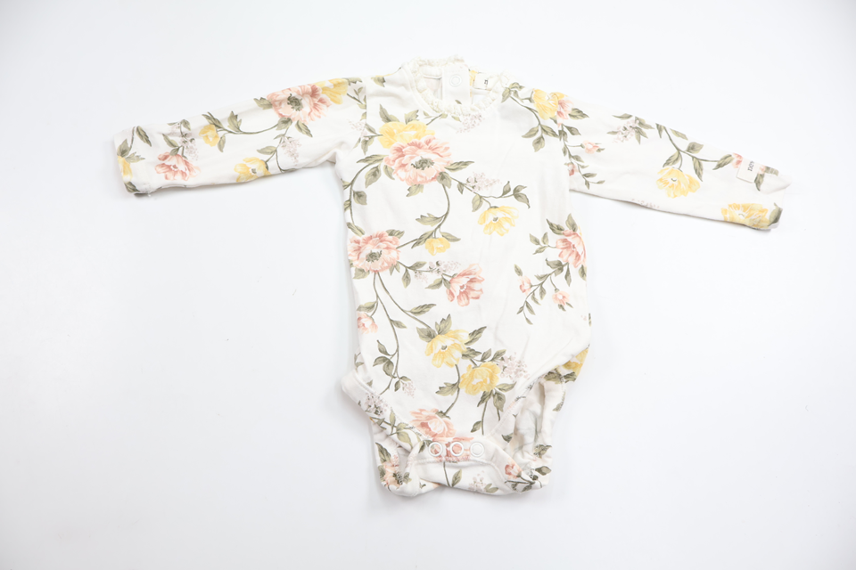 Blommig body från Newbie - Storlek 56 - Vit