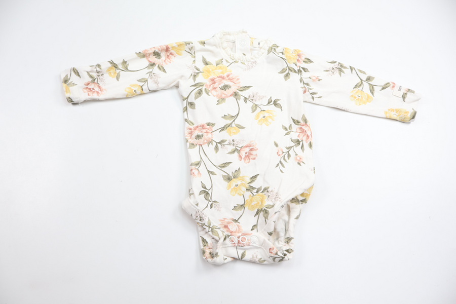 Blommig body från Newbie - Storlek 56 - Vit
