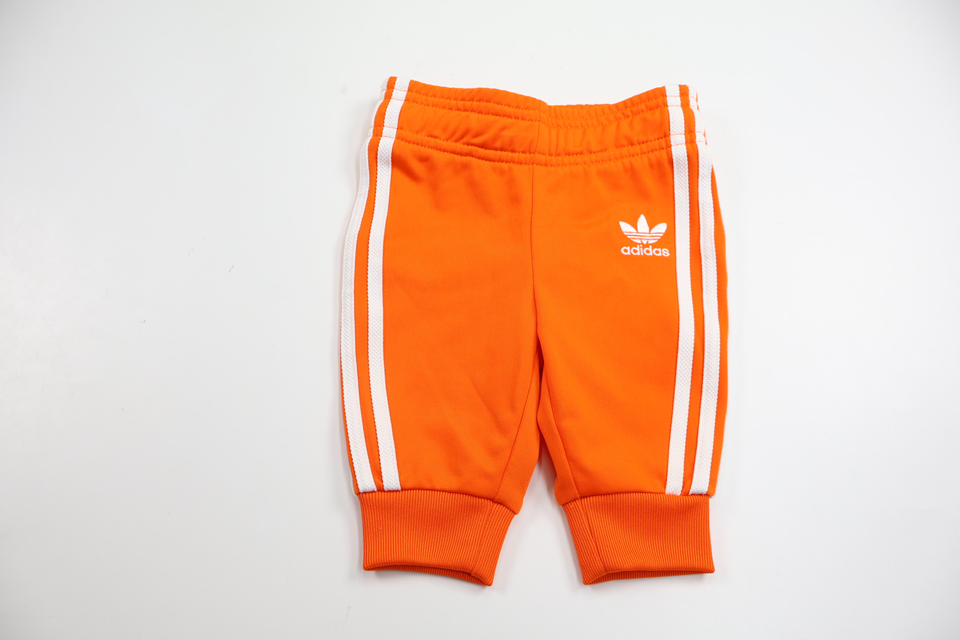 Byxor från Adidas - Storlek 56 - Orange